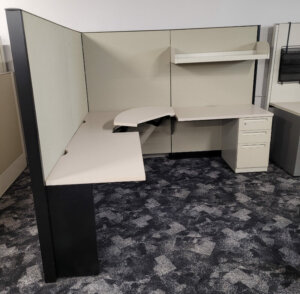 Steelcase Answer L-Shape workstation with dark grey trim and off-white surface. box, box, file pedestal measuring 7' x 7' - 66"h panels
