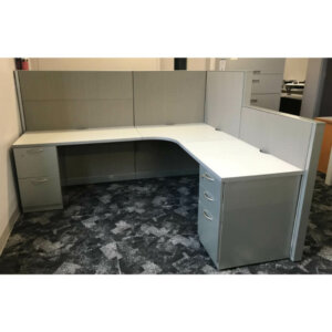 Steelcase L-Shape workstation with grey trim and white/grey checkered surface. File/file and box/box/file pedestal