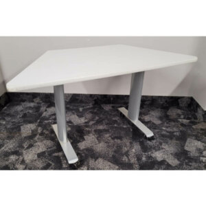 Spec Mobile Trapezoid Flip-Top Table Trapezoid-shaped white laminate flip-top with 14 gauge seam-welded cold rolled steel tube frame Dimensions: 54" on long side x 24" short side x 26" D x 29" H Cable management Locking castors Multiple tables can be configured into a hexagon
