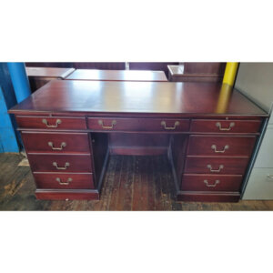 Refinished Traditional Double Pedestal Desk 64"w x 30"d Two pull out writing trays Two file drawers A center pencil drawer and four box drawers