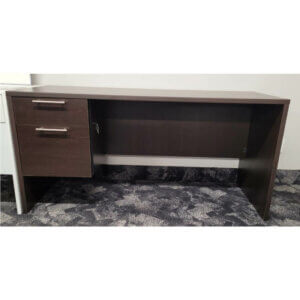 Natalex Desk Cocoa Laminate Overall: 60"w x 24"d 1" thick laminate One locking box/file pedestal Recessed modesty panel
