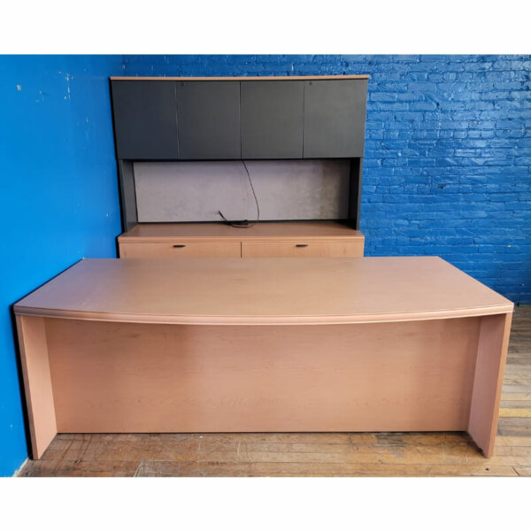Bow Front Desk Suite Main Desk 82.5”w x 41”d Credenza with Hutch 70”w x 24”d x 72”h, 21.5” clearance under the hutch Two box/file pedestals Four 36" lateral file drawers Tackboard Task light Overhead hutch with doors