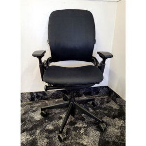 Steelcase Leap V2, Black frame; reupholstered in black 3d mesh, Upper back force, 5" pneumatic seat-height adjustment, Variable backstop, Lower back firmness, Rectilinear independent height-, width-, pivot-, and depth- adjustable arms and soft arm caps, 3" seat depth adjustment, Passive seat edge angle, Adjustable lumbar, 2 1⁄2"-diameter, hard-composition, dual-wheel casters