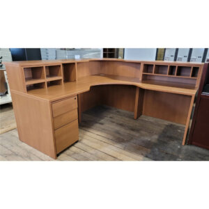 L-Shape 81" x 81" Reception Desk Dimensions: 81” W x 81” D x 42” H Sturdy—1” thick laminate Mobile box, box, file pedestal Removable storage dividers Ergonomic wave top work surface