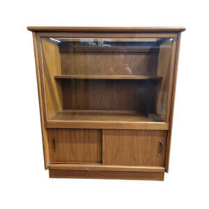 Wood Display Cabinet 37.5" w x 19" d x 42.5" h Hinged top with glass inset Three adjustable shelves Two sliding doors