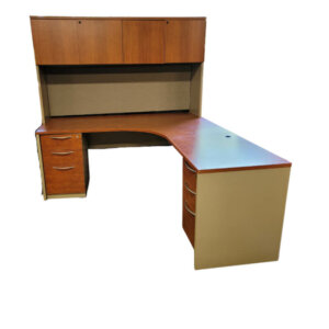 L-shape Desk with Hutch 72" x 77" Cherry surface with grey base 1" thick laminate Two box/box/file pedestals Grommet holes 72"w hutch with doors (24.5" monitor clearance) Tack board Task light