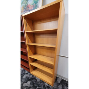Honey Maple Laminate Bookcase 36"w x 72"h Dimensions: 36"w x 13"d x 72"h 1" thick outer frame  1/2" thick laminate shelves Three adjustable shelves Two fixed shelves (including base shelf) Matching maple back