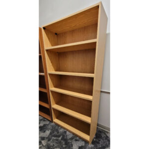 Maple Laminate Bookcase 36"w x 72"h Dimensions: 36"w x 12"d x 72"h 1/2" thick outer frame  1" thick laminate shelves Three adjustable shelves Two fixed shelf (including base shelf) Matching maple back