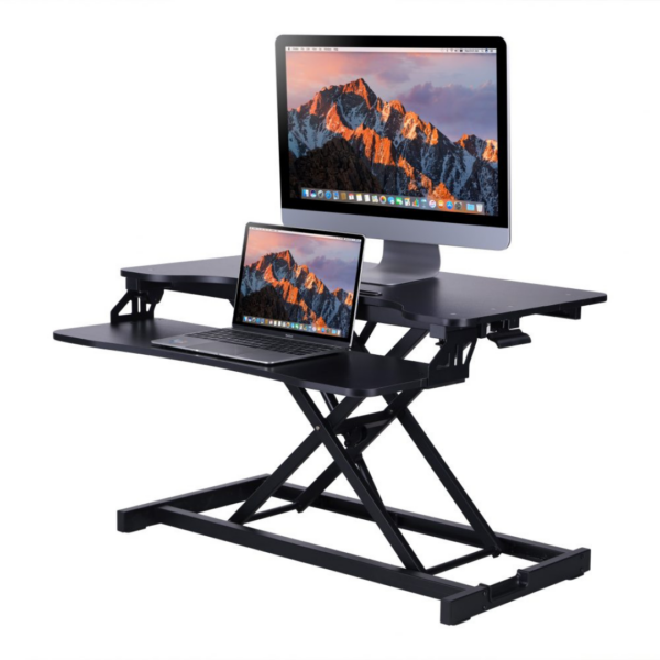The desk riser allows you to go from sitting to standing with ease. The desk riser adjusts 4.3” to 19.7” high. The top worksurface includes a convenient iPad/iPhone slot. A quick-release keyboard tray provides easy reach to your keyboard even when standing and can detach easily when necessary. Large 31.5” x 17” work surface EVR Enhanced Vertical Range from 4.3” to 19.7” Weight capacity up to 30 lbs Stocked in black or available to order in grey Rear grommet for optional monitor arm Full size 29” x 10” fixed keyboard tray 10.5” wide slot holds tablet or phone Easy-lift side handle Quick disconnect keyboard tray allows portable use