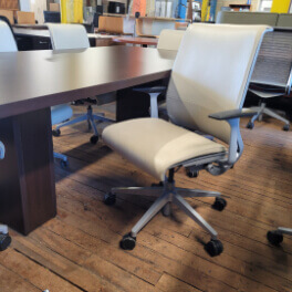 Steelcase Think Meeting Chair  V1 , Silver frame with cream mesh or cream fully upholstered back rest , 5" pneumatic seat-height adjustment, Variable backstop, fixed arms, 3" seat depth adjustment, Passive seat edge angle,fixed lumbar, 2 1⁄2"-diameter, hard-composition, dual-wheel casters